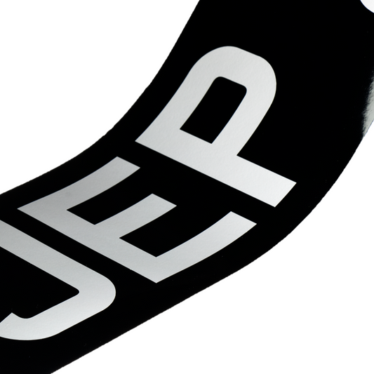 Self-adhesive: black oblong with white 3 1/8" digits